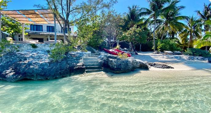 Villa seen from the water at Sac Bajo